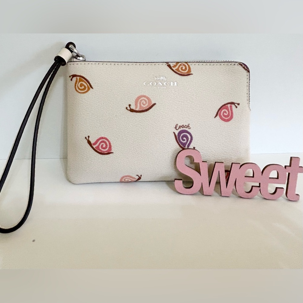 Coach Cream Wristlet with Snail Design